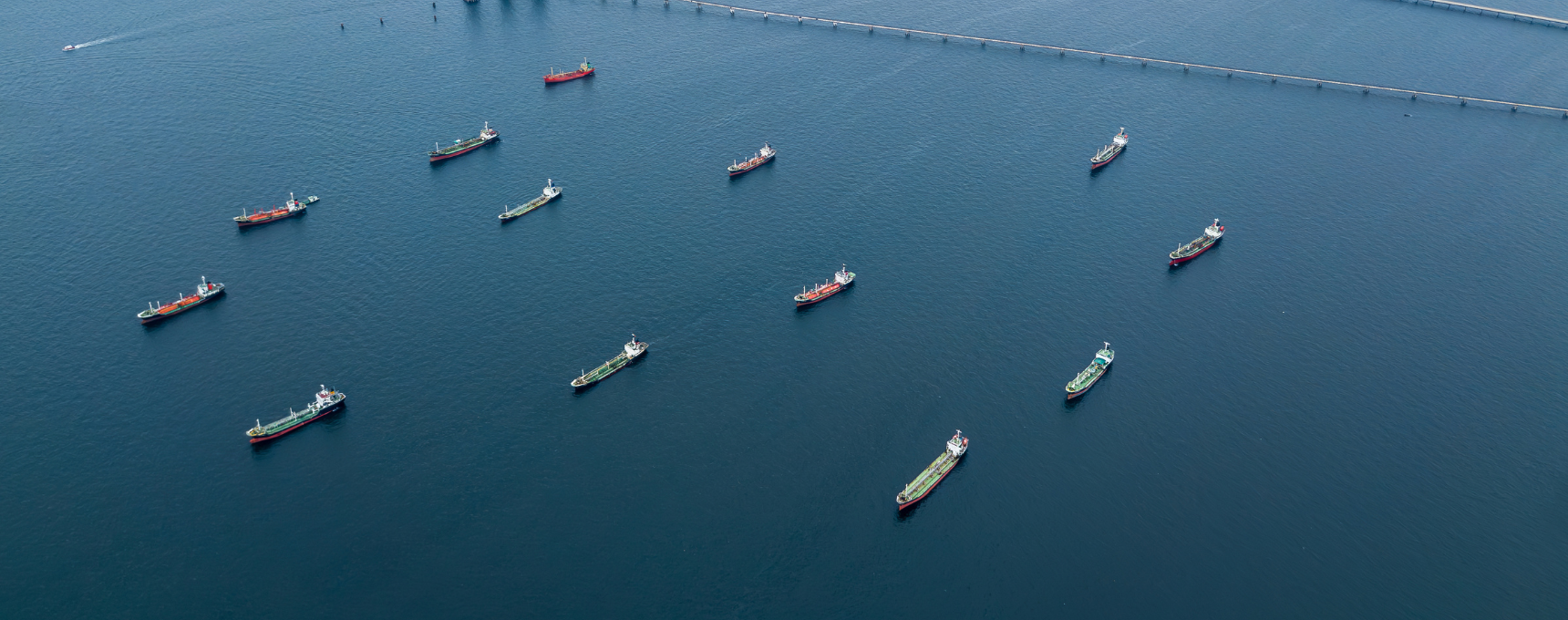 anker vessel waiting at anchor near an EU port, illustrating the cost of anchorage delays.